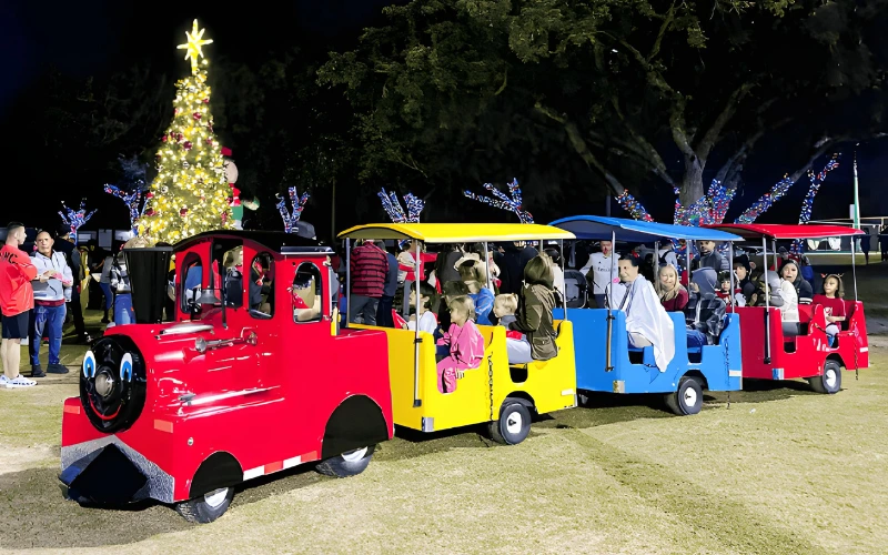 Kids enjoying train ride attraction