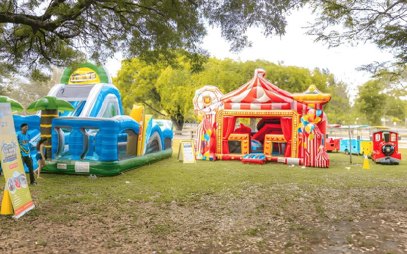 Party featuring inflatables and train rides