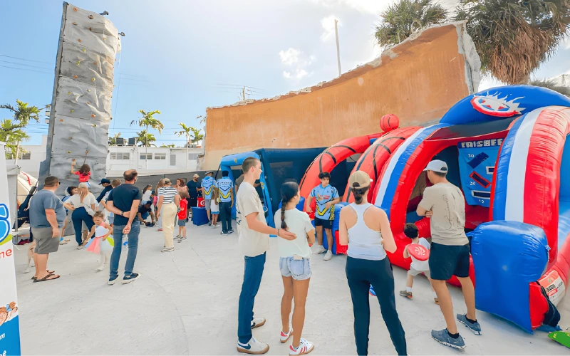 Festival with rock climbing wall and inflatables